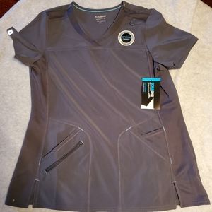 Scrub top. Brand new still with tags. Grey. Super silky with great pockets